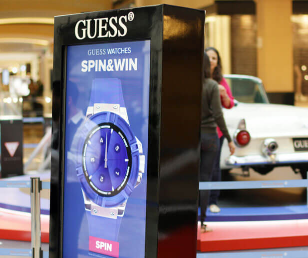 Guess Watches Spin & Win Stand