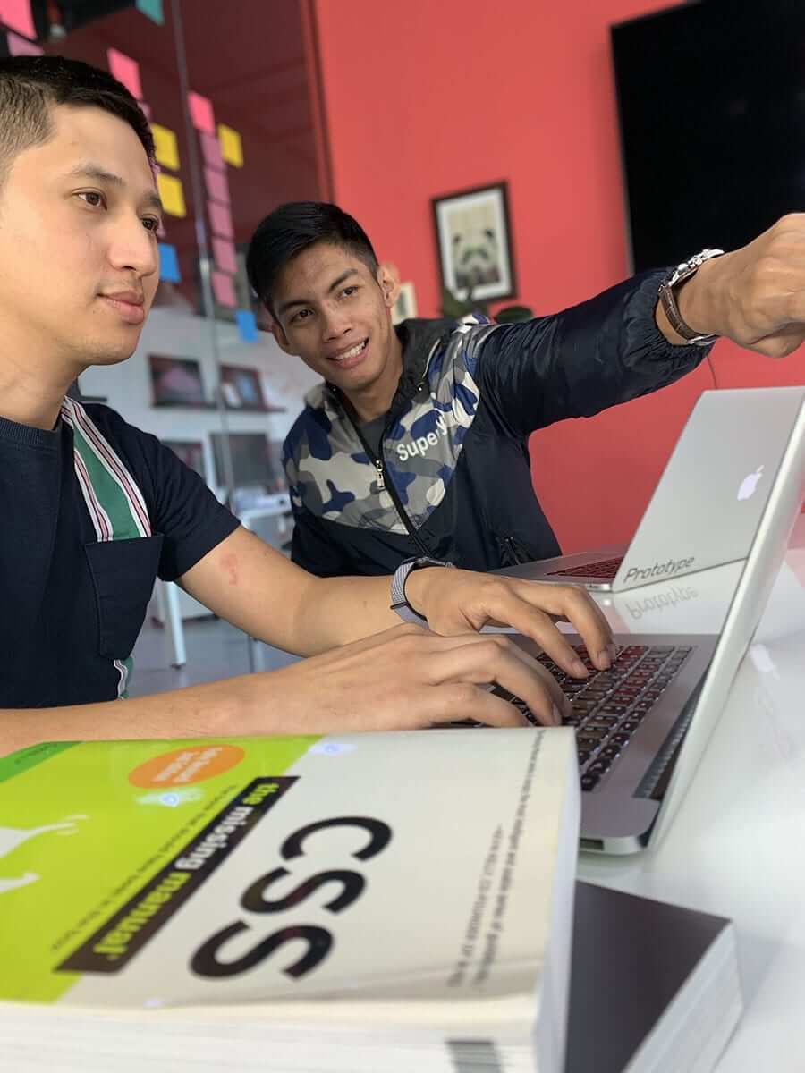 digital strategist and developer discussing